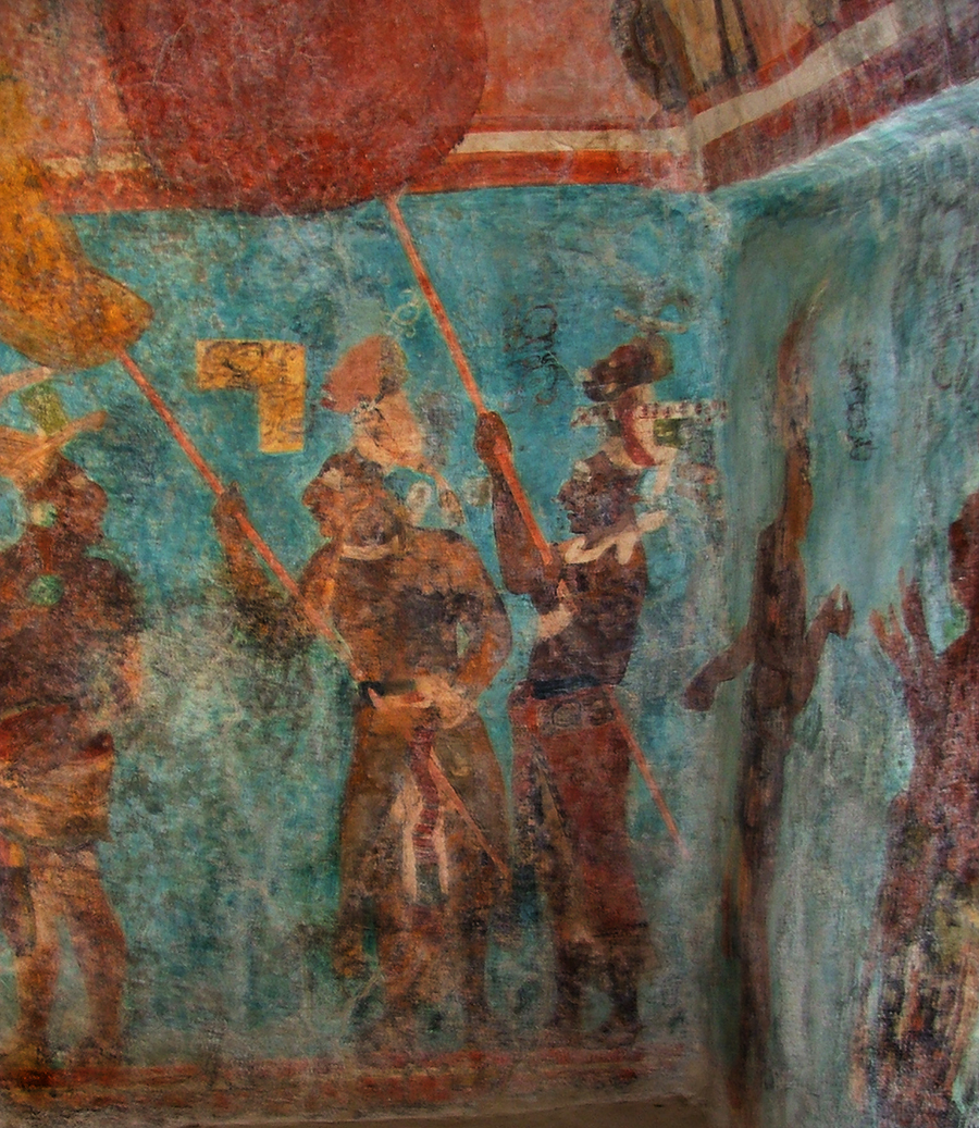 Bonampak Murals, Room 1, lower register, right center wall: Nobles holding huge fans that extend up into the hieroglyphic band that separates the paintings.