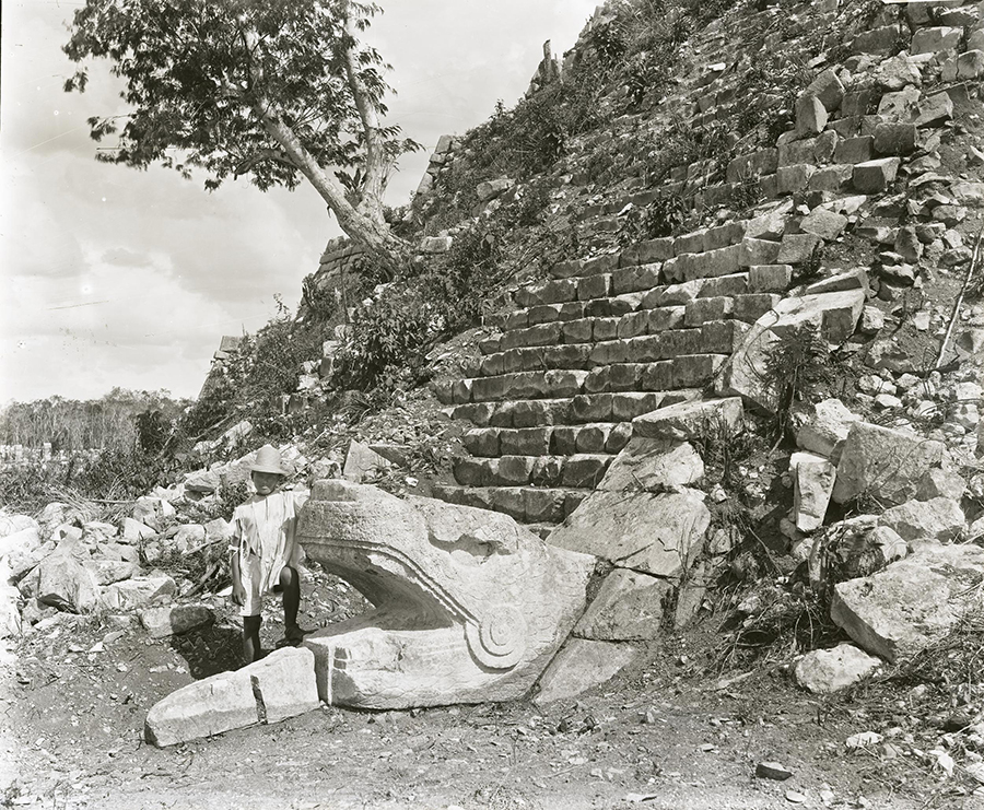 Maudslay's 1889 photo of the giant feathered serpent heads anchoring the balustrad of the Temple of Kukulkan