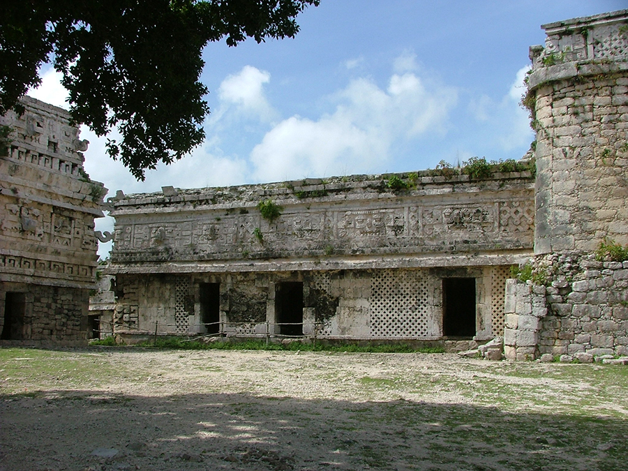The small courtyard formed by the eastern wing of  Casa de Monjas and La Iglesia at Chichen Itza