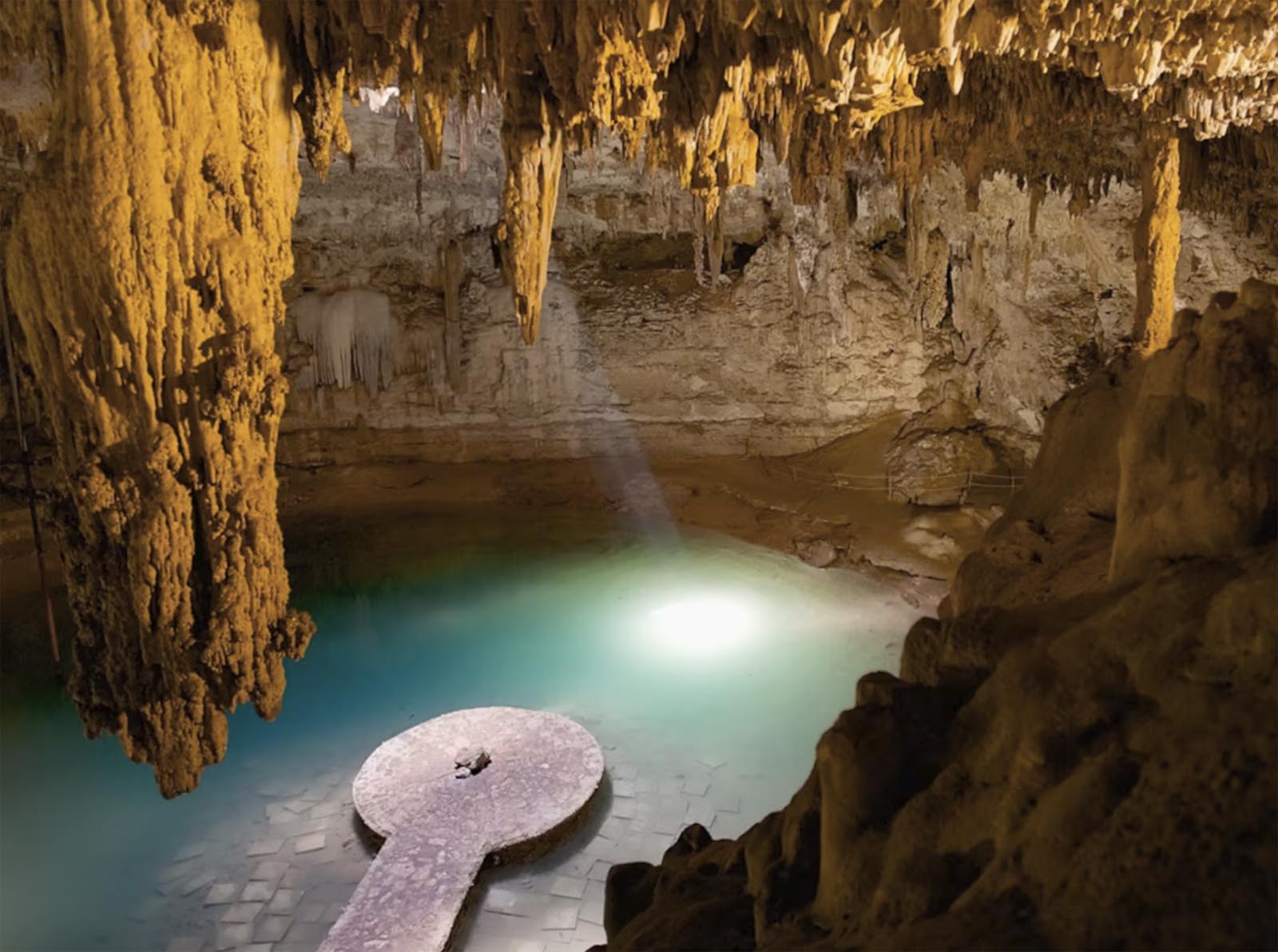 Cenote at Chichen Itza, Mexico showing Maya platform